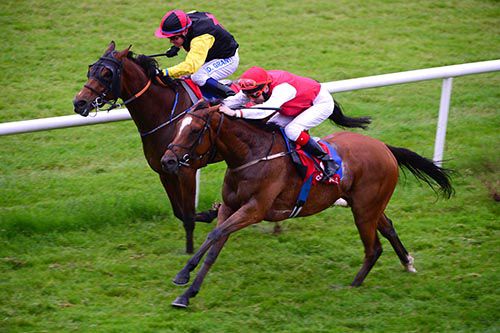 Edith Cowan (near side) beats Brog Deas 