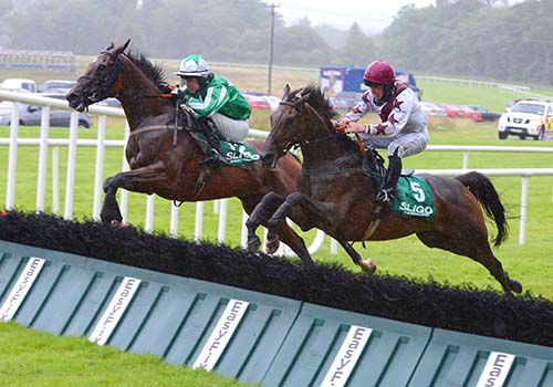 Cheap As Chips (green) and Hurricane Jojo jump the last together