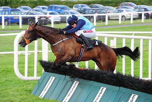 Cailin Annamh jumps a hurdle on her way to victory under Barry Geraghty
