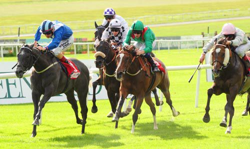 Jayed Jidan is driven out by Pat Smullen to beat Stronger Than Me (cheekpieces) and Karamaya (green)