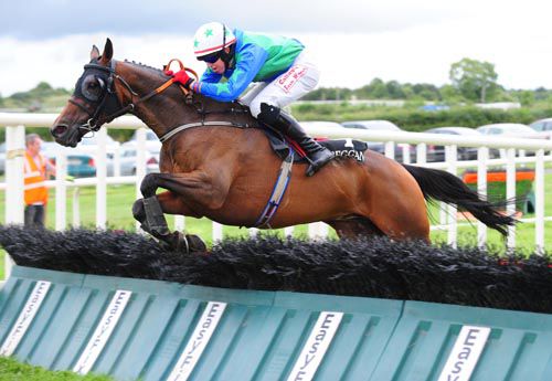 Katys Girl and Keith Donoghue pop the last at Kilbeggan