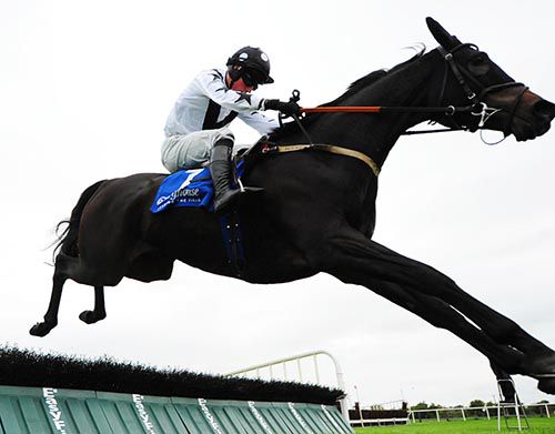 Another good jump from Theatre Mill under Mikey Fogarty at Fairyhouse