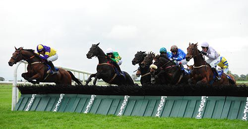 Top Spin chases The Amarillo Kid over the last with Fantasy King (eventual 2nd) down the outer