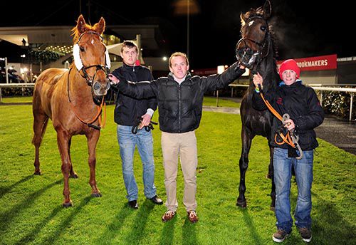 Winner Majestic Timeline (left), Times In Anatefka (2nd, right) and trainer Adrian Joyce in the middle