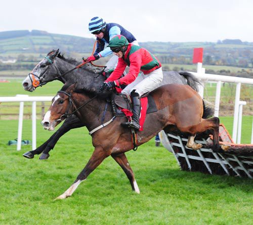 Moreece (nearside) and Oscar's Passion (winner) battle it out at Punchestown