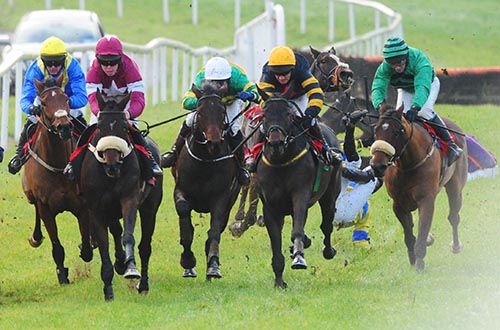 Ange Balafre (2nd right) races towards the last with plenty of drama going on behind