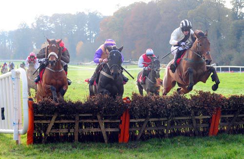 Emily Gray (right) strikes the front at the final hurdle