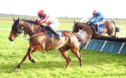 Rightville Boy and Adrian Heskin jump the last ahead of Drive On Locky