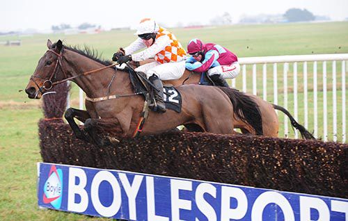 Blazing Sonnet and Andrew Leigh lead Davy Russell on Kilcarry Bridge over the last in the opener at Thurles 