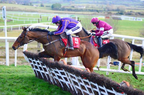 Wicklow Brave jumps the last in front of Lieutenant Colonel 