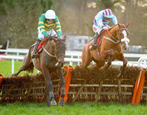 Florishwells D'ete (left) jumps the last from Space Ship before going on to take the fifth at Gowran