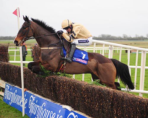 On His Own and Ruby Walsh clear the final fence in the Grade 2 At The Races Bobbyjo Chase at Fairyhouse
