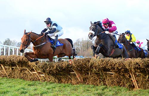 Art Of Payroll (left) strikes the front at the last under Paul Carberry