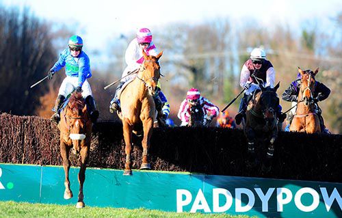 Pass The Hat (centre) jumps the last with He'llberemembered (left) and Kylecrue (right)
