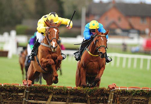 Black Spot On (Mattie Bowes, nearside), clears the last from Tulsa Jack (Paul Carberry) at Down Royal