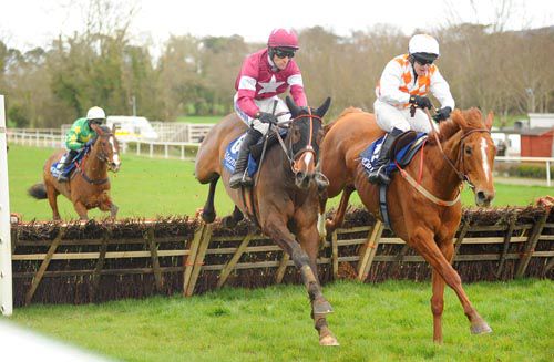 Desertmore Stream (left) and the disqualified Gold Platinum jump the last