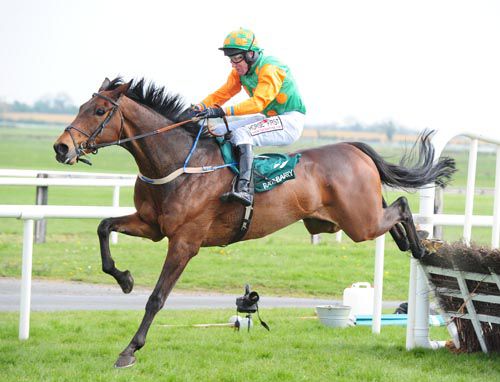 Cara's Oscar and Robbie Power jump the last 