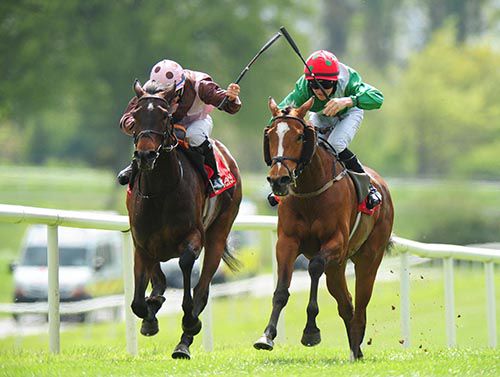 Sophie's World and Sean Corby (right) see off the challenge of Kanes Pass and Wayne Lordan 