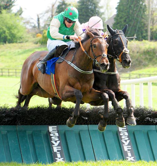 Lord Adare and Davy Russell (left) jump the final flight