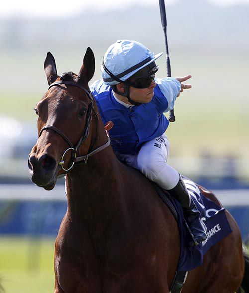Maxime Guyon celebrates after winning the Qipco 1000 Guineas on Miss France