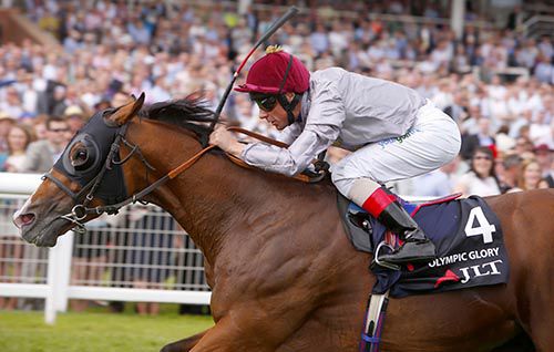 Olympic Glory and Frankie Dettori winning the JLT Lockinge Stakes at Newbury