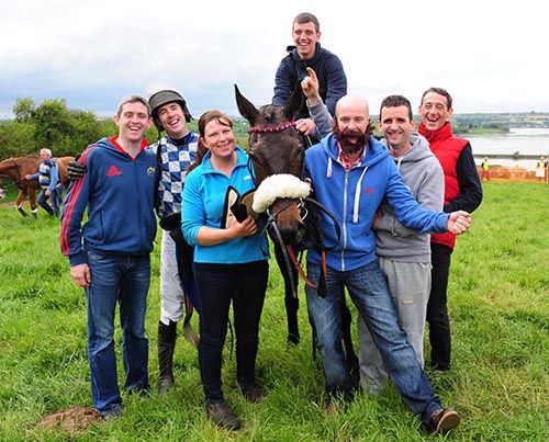 Second from right Sam Curling trained Seeyouatmidnight to win his point-to-point