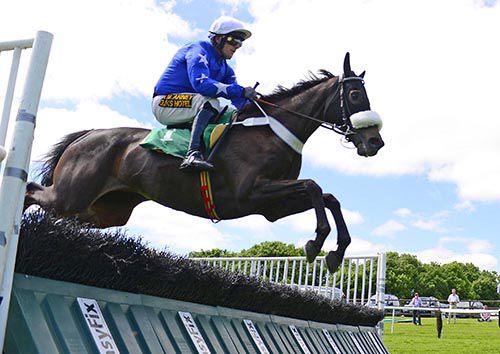 Smiler clears the last under his trainer and owner Mikey O'Connor
