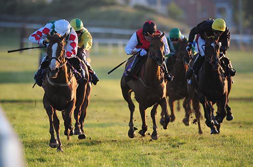 Our Girl Naoise (Johnny King, left) stays on best from Damefirth (centre) and Cruisingdownriver (right)