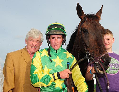 John Carr with jockey David Hickey, Barney King and groom