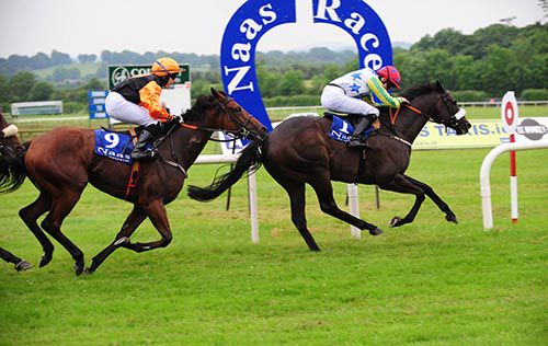 Lake George passes the winning post in front under Dylan Robinson from Les Darcy in second