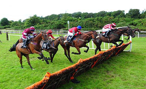 Jarob (Robbie Colgan) leads over the last