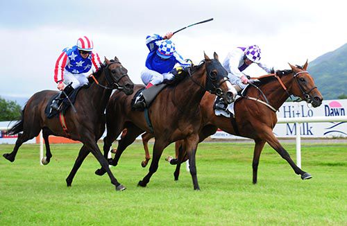 Teocht (right) battles out the finish with Carenza (centre) and Castle Bar Sling