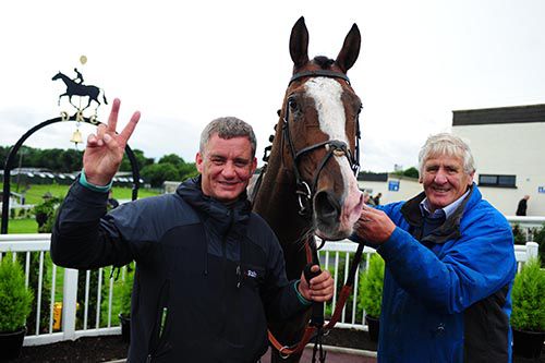 Brian Hamilton with Farewelltocheyenne and his father Brian senior after he completed a double at his local track