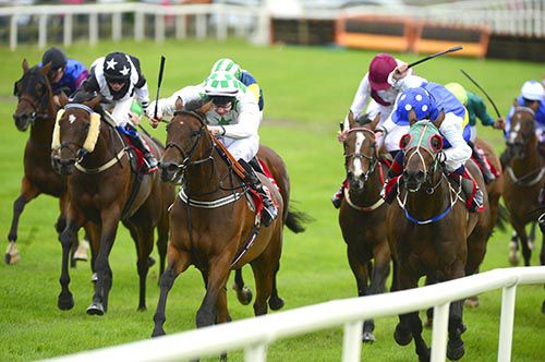 Hilary (centre, white & green)