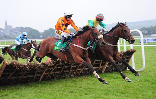 Res Ipsa Loquitur (Mikey O'Connor, nearside) lands over the last with Ontheground, before going on to win