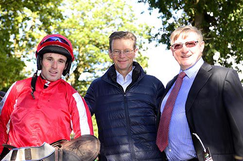 Jockey Sean Flanagan, owner Stephen McCarthy, centre, and trainer William Durkan 
