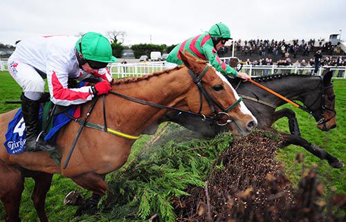 Ros Brin and Davy Russell head Down Ace and Paul Carberry at the last
