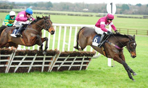 Mckinley and Paul Townend chase down Tell Us More and Bryan Cooper