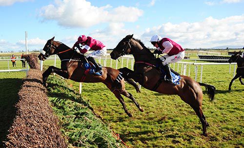 Roi Du Mee (left) is about to be strongly pressed by Foildubh at the last