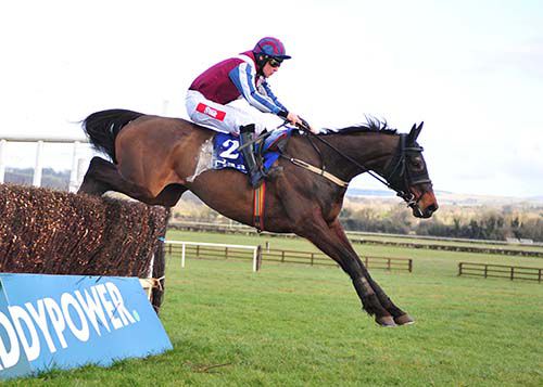 Fine Rightly and Davy Russell jump the last