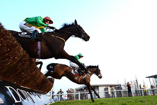 Flynsini (nearest) under jockey Paul O'Neill clears the last to win from Mtada Supreme