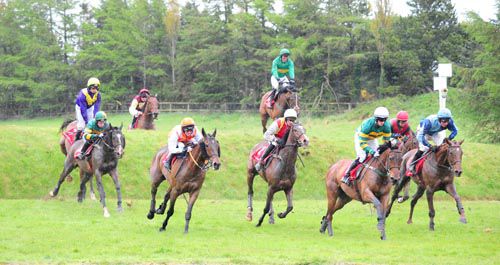 Josies Orders and Nina Carberry, on left, race off the Big Double at Punchestown