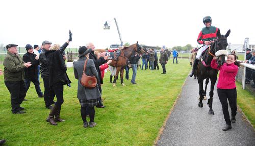 Lucky Pat is greeted on his return