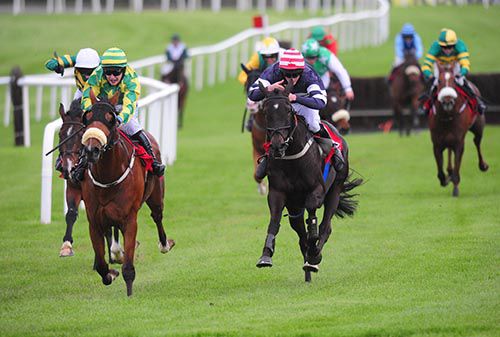 As De Pique (right) pictured on his way to victory at Punchestown on his last start
