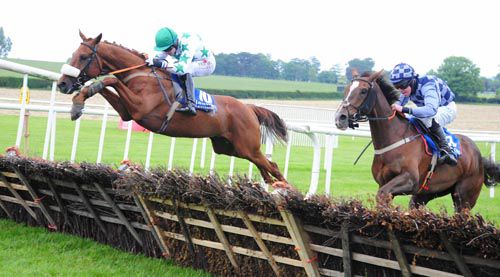 Colms Dream (noseband) puts in a spectacular jump at the last