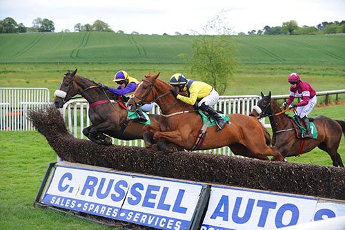 Bridgets Pet (nearest) comes through to lead at the last under John Fitzpatrick