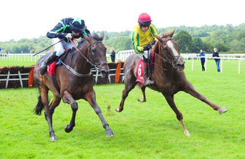 Late Night Deed (right) and Misty Weather battle out the finish