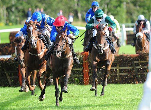 Pace And Passion (red cap) winning under Jody McGarvey