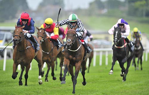 Go Kart (centre) is driven out by Robbie Downey