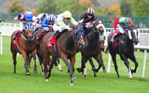 Well Done Me, green cap, hits the front in Cork